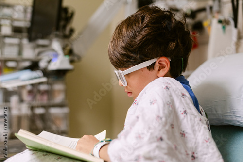 Tween boy at ER cubicle