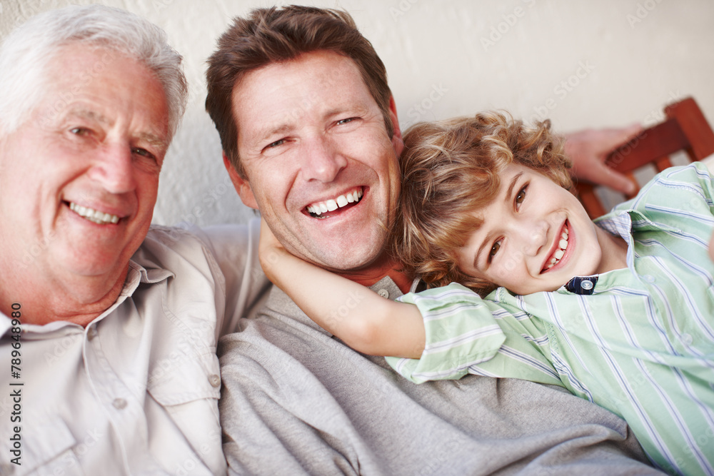 Portrait, hug and kid with father, grandfather and laughter in a house with care, trust and support. Happy family, bonding and man generations in living room for weekend, vacation or reunion at home Portrait, hug and kid with father, grandfather and laughter in a house with care, trust and support. Happy family, bonding and man generations in living room for weekend, vacation or reunion at home
