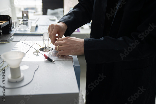 Person Working With Scientific Equipment photo