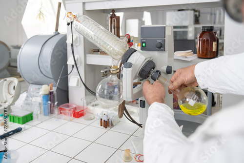 Person Working With Rotary Evaporator photo
