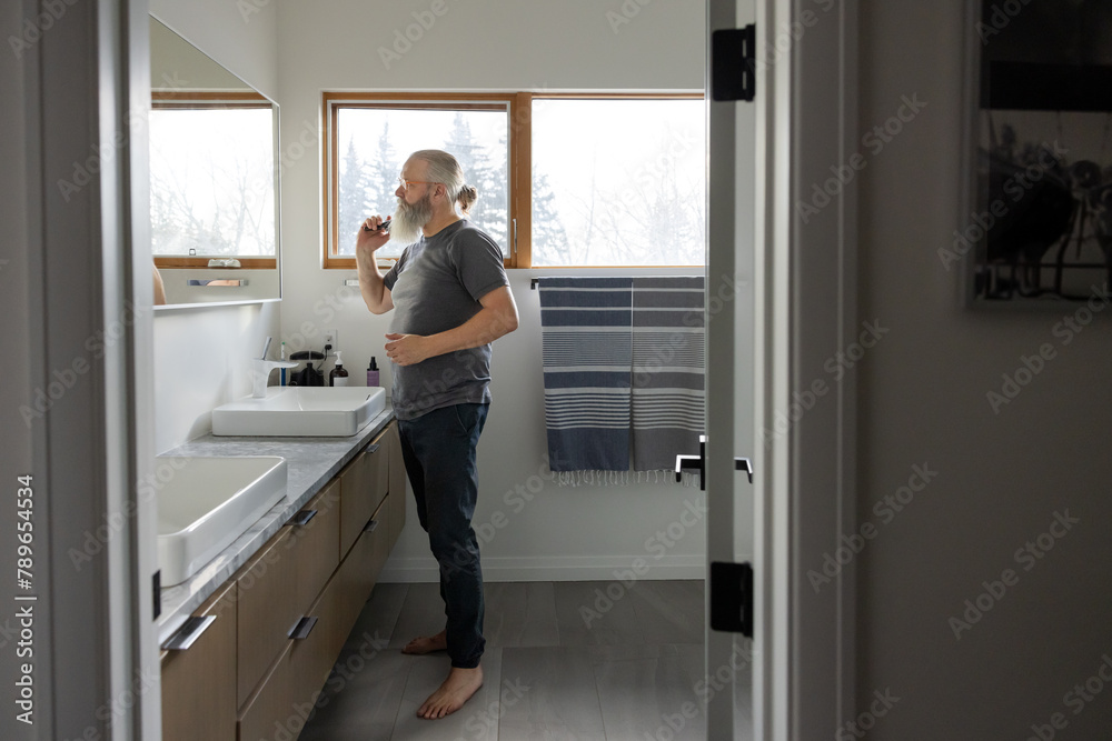 Man Combing Beard Man Combing Beard
