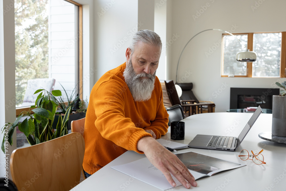 Exploring Pamphlet With Laptop Exploring Pamphlet With Laptop