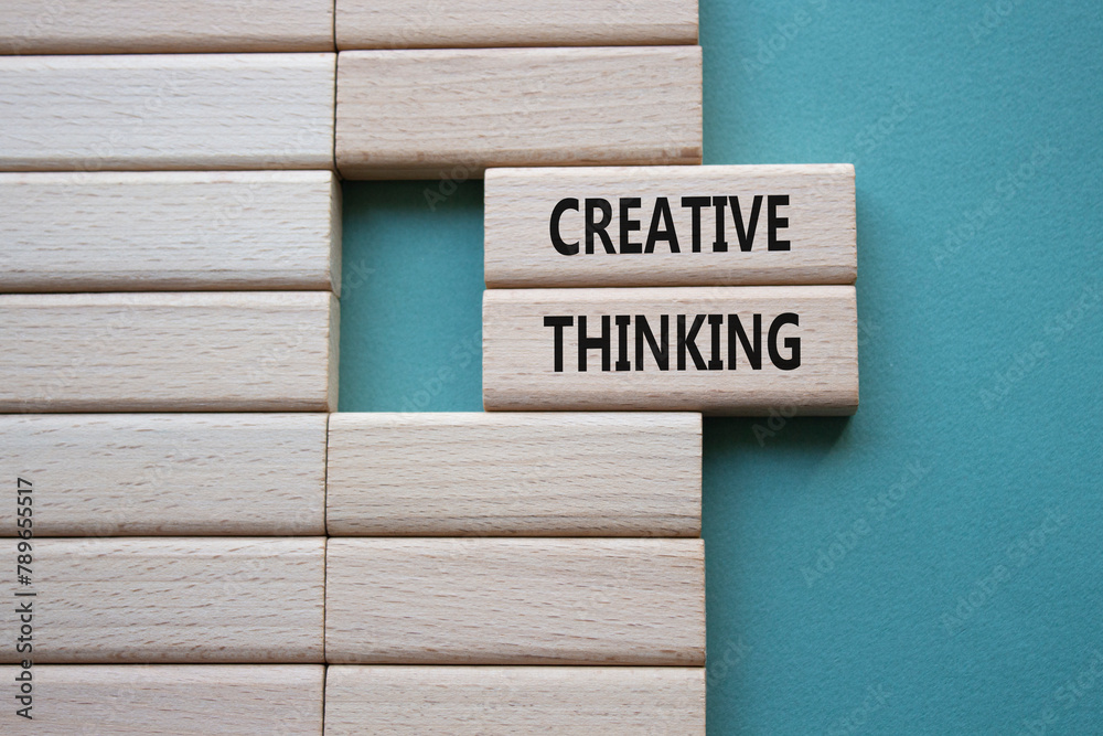 Creative thinking symbol. Wooden blocks with words Creative thinking. Beautiful grey green background. Business and Creative thinking concept. Copy space. Creative thinking symbol. Wooden blocks with words Creative thinking. Beautiful grey green background. Business and Creative thinking concept. Copy space.