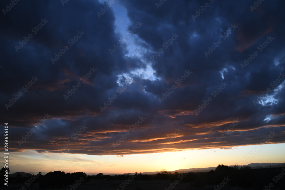 Fototapeta premium Purple Orange Clouds at Sunset Desert