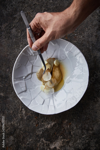 Chef Decorating The Plate photo