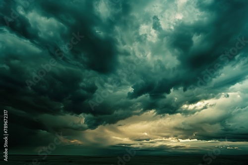 : A dramatic skyscape with dark, brooding clouds foretelling an approaching storm.