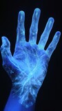 A hand with blue light shining through it and a glowing image of the inside, AI
