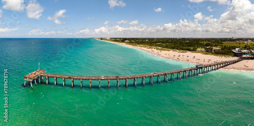 Bright ocean landscape at Venice fishing pier in Florida, USA. Popular vacation place in south photo