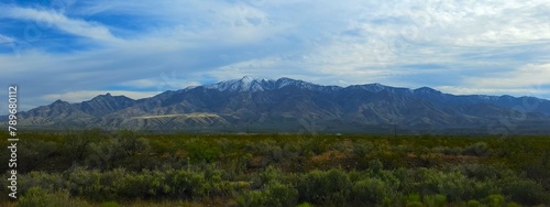 Snow tipped Arizona mountains in a rural valley wilderness