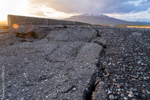 фотографія Cracked old asphalt, road safety concept