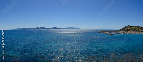 View of the Island of Elba and the marina of Salivoli with Punta Falcone, Piombino, Tuscany, Italy