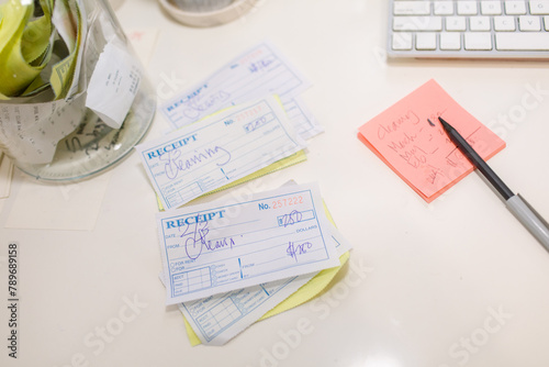 Receipts on desk photo