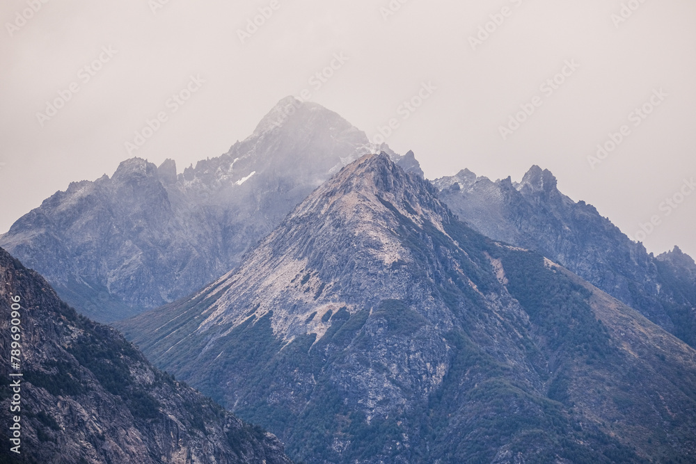 top of Cerro Lopez, rocky mountain in southern Argentina, Bariloche and San Martin de los Andes, Patagonia Route 40. Poplar trees in autumn changing color to yellow-green