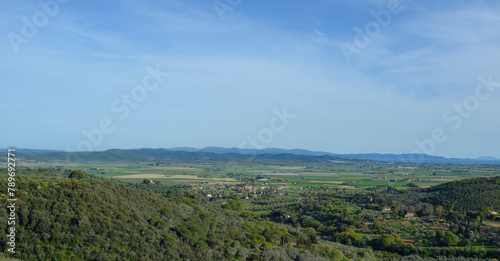 Aerial view of the Val di Cornia with hills, cultivated fields and the sea, Campiglia Marittima, Tuscany, Italy