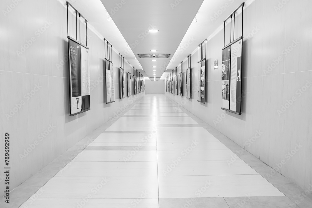 Decorative informative banner mounting on the wall corridor. Black and white 