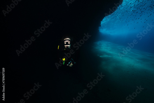 Active woman scuba diver enjoying peace and quiet photo