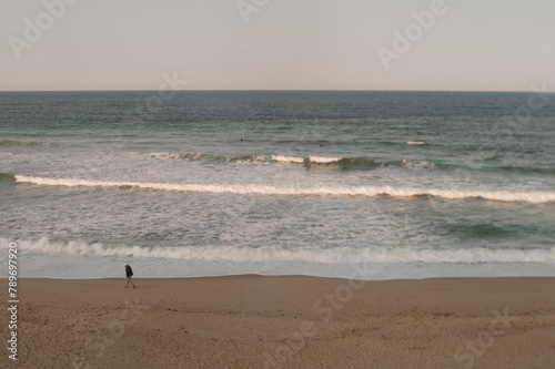 Man on the beach in Cape Cod photo