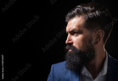 Male face profile with beard and mustache. Shampoo and conditioner for a clean and soft beard. Man beauty care, facial hair care. Beard oil.