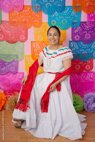 Elegant and happy Woman in White Mexican Folk Dress with Red Shawl