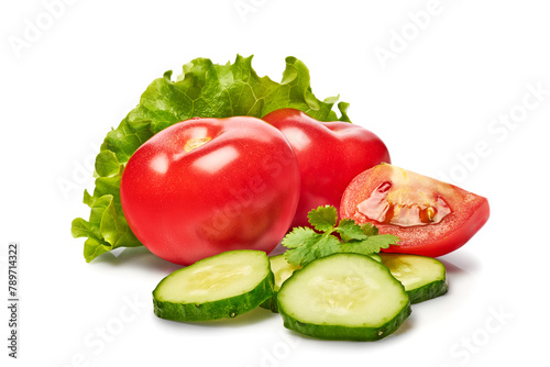 Fresh vegetables tomatoes, cucumbers, and lettuce isolated on a white background. Clipping path