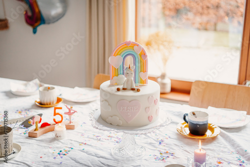 Unicorn and Rainbow themed birthday cake and table