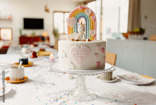 Unicorn and Rainbow themed birthday cake and table