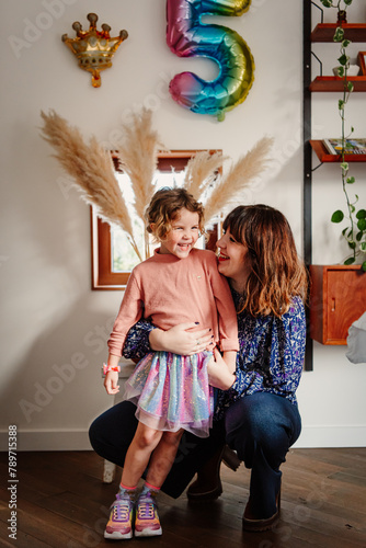 Mother wishing daughter a very happy birthday photo