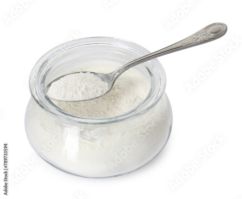 Baking powder in glass jar and spoon isolated on white