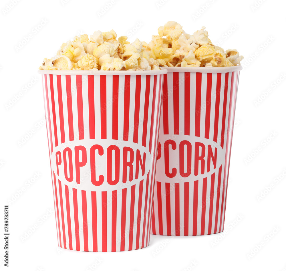Tasty fresh popcorn in buckets isolated on white Tasty fresh popcorn in buckets isolated on white