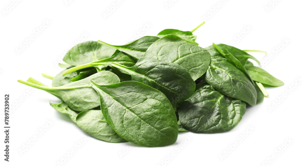 Pile of fresh spinach leaves isolated on white Pile of fresh spinach leaves isolated on white