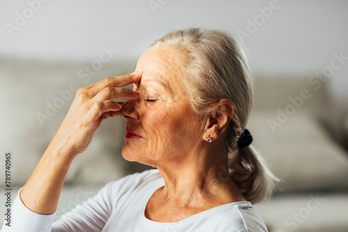 Woman doing yoga at home photo