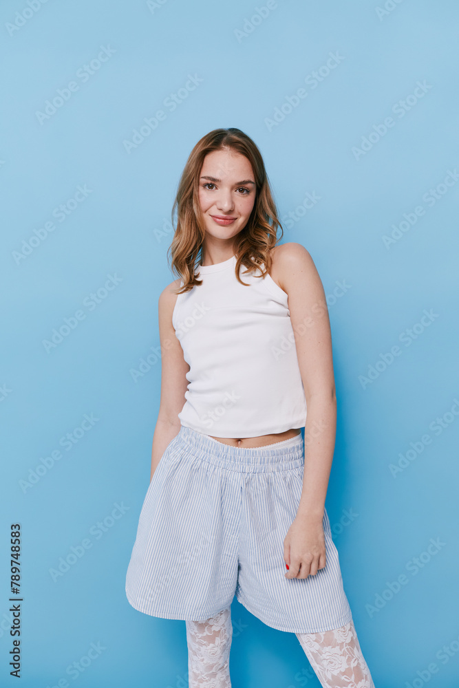 Portrait of happy woman over studio background Portrait of happy woman over studio background