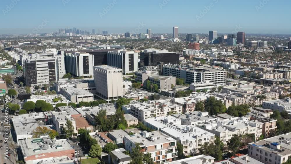 Aerial view of Beverly Hills shops, homes, apartments, downtown, and skyline Aerial view of Beverly Hills shops, homes, apartments, downtown, and skyline