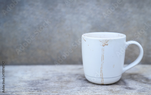 dirty coffee stain on ceramic cup from drinking in stain for cleaning concept