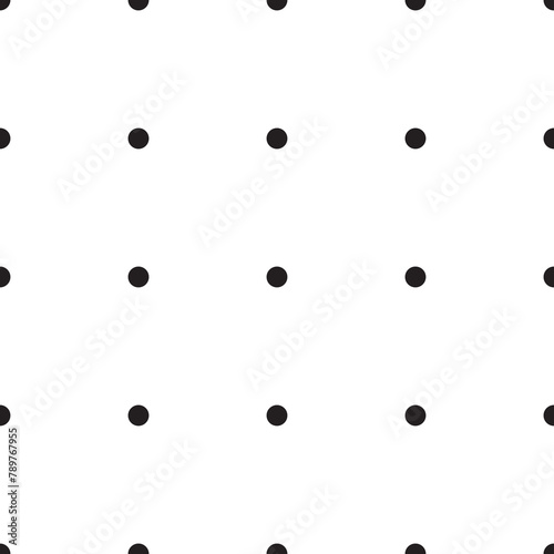 Seamless pattern with black dots with a lot of space between the circles.