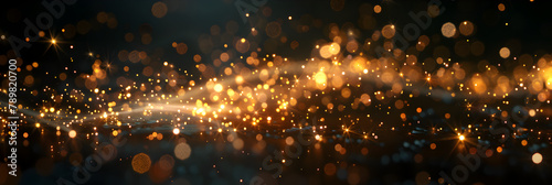 Bokeh Abstract Background with Glitter Lights Blurred Soft vintage colored,Space sparkle blurry abstract spark bokeh black glowing design glistering light shine glamour magical bright shiny gold chri
 photo