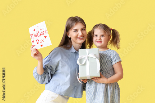 Little girl with her mom ho...