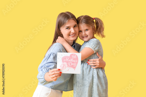 Little girl with her mom ho...