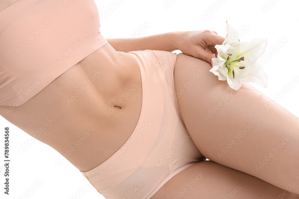 Beautiful young woman in underwear with white lily flower sitting on white background, closeup - obrazy, fototapety, plakaty 