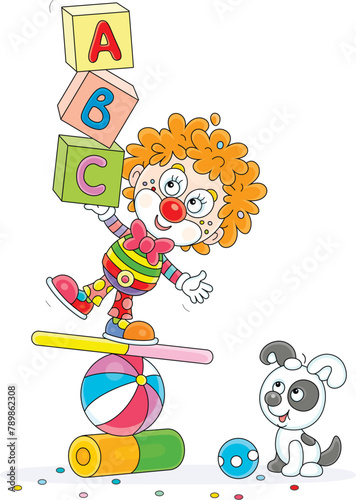 Funny red curly-headed clown equilibrist playing with his small pup and balancing with children’s cubes on a colorful ball, board and cylinder in a fun circus performance, vector cartoon illustration