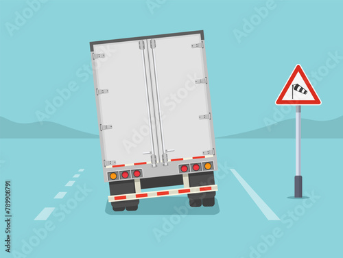 Isolated back view of a truck on windy road. Crosswinds ahead sign area. Flat vector illustration template.