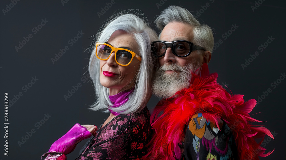 copy space, stockphoto, high resolution, senior Caucasian couple in vivid extravagant outfits and glasses with gray hair, professional photo shoot. elderly couple, man and woman,extravagant vibrant co copy space, stockphoto, high resolution, senior Caucasian couple in vivid extravagant outfits and glasses with gray hair, professional photo shoot. elderly couple, man and woman,extravagant vibrant co