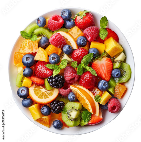 Colorful mixed fruit salad in a white bowl isolated on transparent background