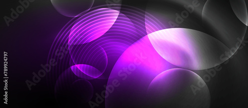 Vibrant purple circles on a black background create an electric and vivid pattern. The magenta and violet hues mix together to form a colorful and dynamic design