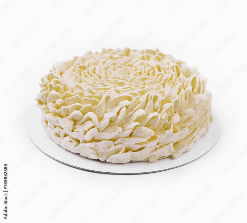 Elegant white rosette cake isolated on white Elegant white rosette cake isolated on white