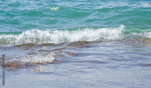 Soft wave of sea on sandy beach. Background.