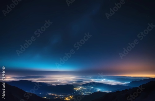 Magical night sky with stars on the sleeping city and mountains