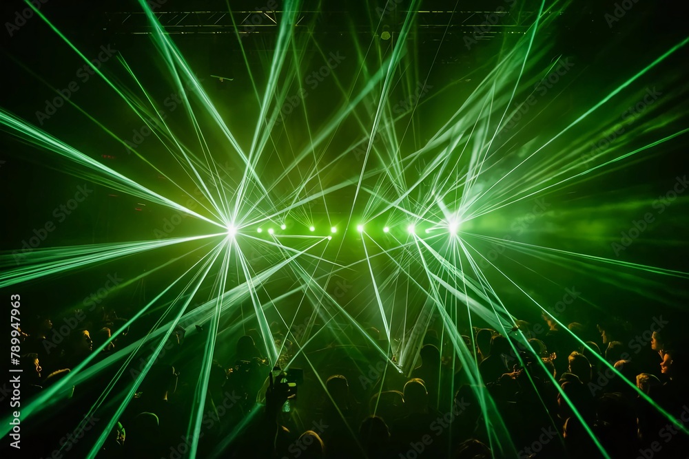 Naklejka premium Lasers shooting out over the crowd at concert 