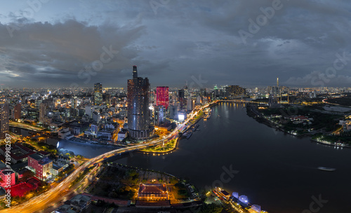 Aerial drone skyline video of Saigon cityscape at sunset in District 1, with Sai Gon river view