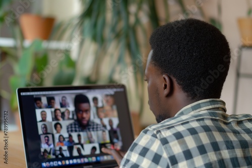 a black man doing video meeting on a laptop, zoom meeting closeup, video conference, business meeting, successful business conference meeting, virtual meeting, skype meeting, meeting